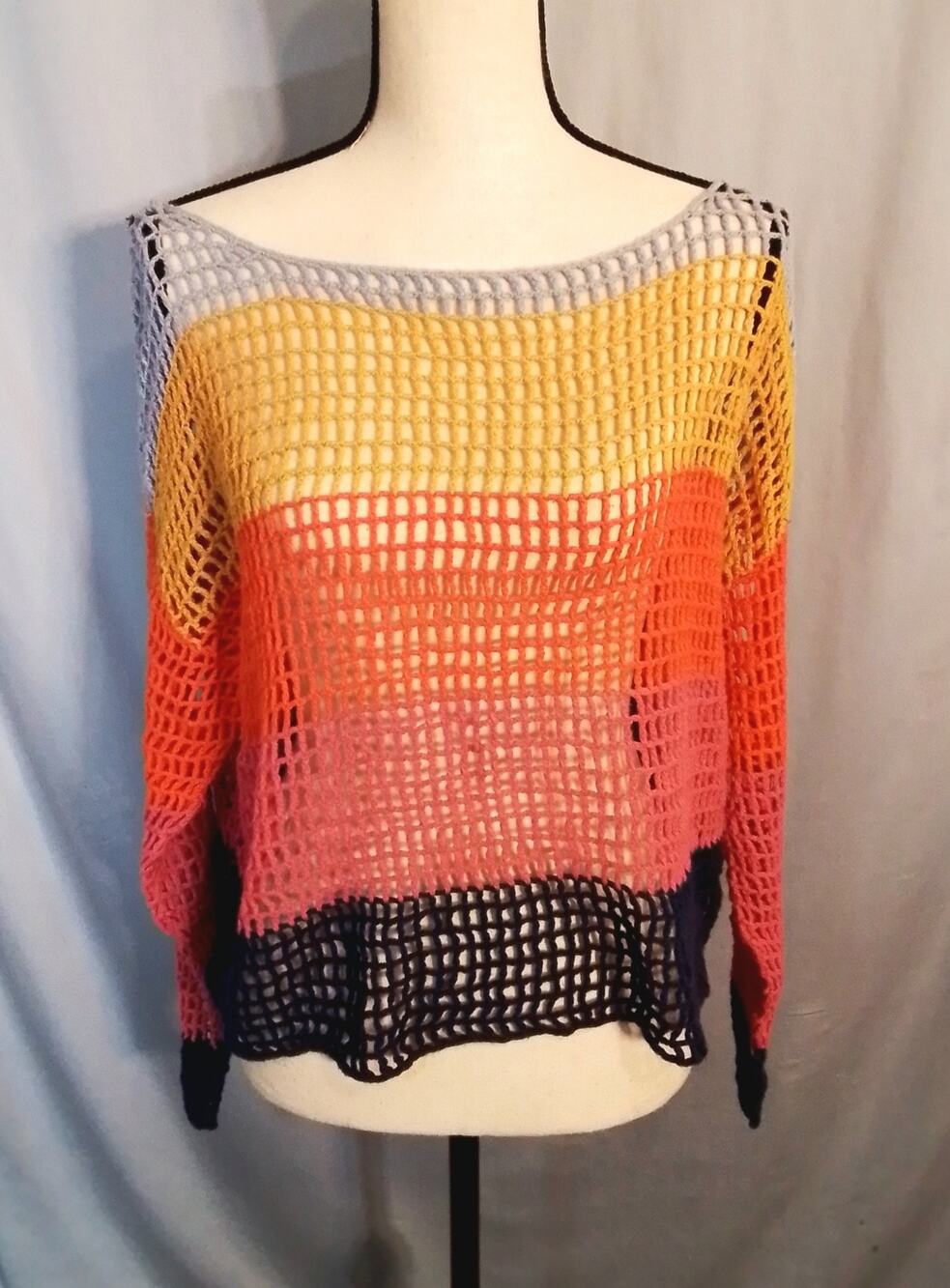 Forever 21 crocheted multi colored open stich cover sweater.